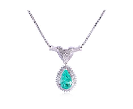 A COLOMBIAN EMERALD AND DIAMOND NECKLACE
Featuring a pear shaped Colombian emerald weighing approximately 2.20 Cts, mounted i