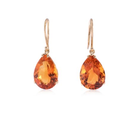 A PAIR OF CITRINE AND DIAMOND HOOP EARRINGS
Featuring a pair of pear shaped citrines weighing approximately 8.0 Cts, mounted 
