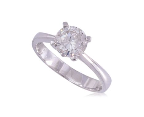A DIAMOND SOLITAIRE RING Featuring a round brilliant cut diamond weighing approximately 1.18 Cts, mounted in a white gold set