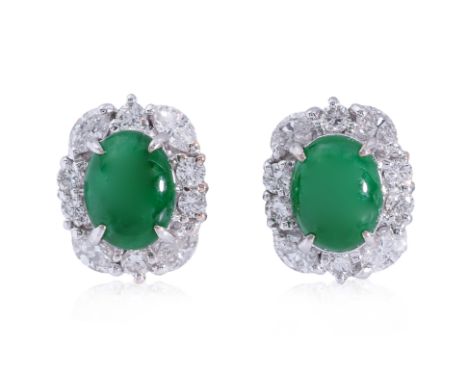 A PAIR OF JADEITE AND DIAMOND STUD EARRINGS Featuring a pair of jadeite cabochons measuring approximately 6.90 x 5.30 mm, mou