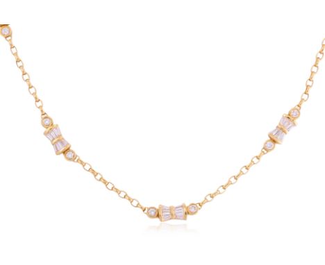 A DIAMOND NECKLACE
Featuring round brilliant cut diamonds totalling approximately 0.30 Cts, mounted in a yellow gold setting 