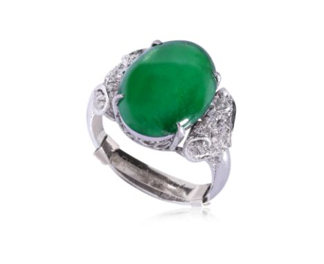 A TYPE A JADEITE AND DIAMOND RING
Featuring a type a jadeite measuring approximately 14.70 x 10.56 x 3.05mm, mounted in a pla