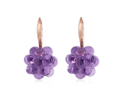 A PAIR OF 'GRAINS DE MURE' AMETHYST EARRINGS BY BOUCHERON
Featuring a pair of blackberry shaped carved amethyst, mounted to a