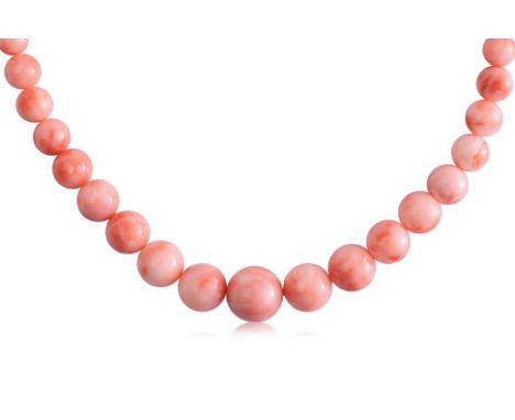 A GRADUATED CORAL NECKLACE Featuring graduated coral beads measuring approximately 4.5-12.0mm, attached to a silver clasp mar