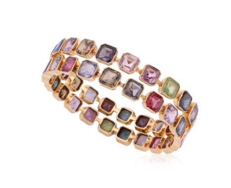 A PAIR OF MULTI GEMS SET BANGLE
Featuring a pair of yellow gold bangles, set with multi coloured gems, mainly spinels, totall
