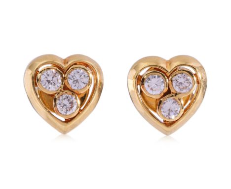A PAIR OF DIAMOND 'HEART' STUD EARRINGS
Featuring round brilliant cut diamonds totalling approximately 0.30 Cts, mounted in a