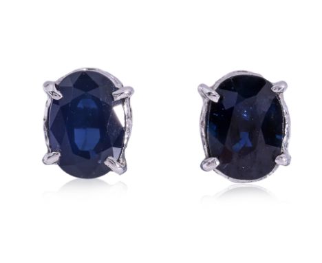 A PAIR OF SAPPHIRE STUD EARRINGS
Featuring a pair of oval sapphires measuring approximately 2.40 Cts (marked), mounted in a w