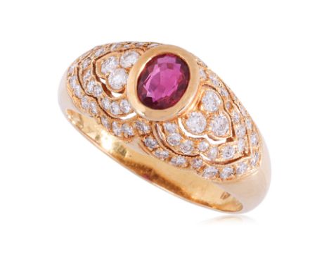 A RUBY AND DIAMOND RING
Featuring an oval shaped ruby weighing approximately 0.55 Cts, mounted in a yellow gold setting with 