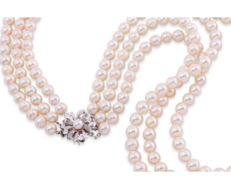 A THREE STRAND AKOYA PEARL NECKLACE
Featuring three strands of akoya cultured pearls measuring approximately 6.0-6.5mm, attac