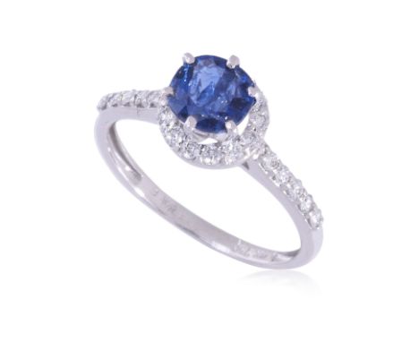 AN UNHEATED BURMESE SAPPHIRE AND DIAMOND RING
Featuring a cushion shaped sapphire weighing approximately 0.75 Cts, mounted in