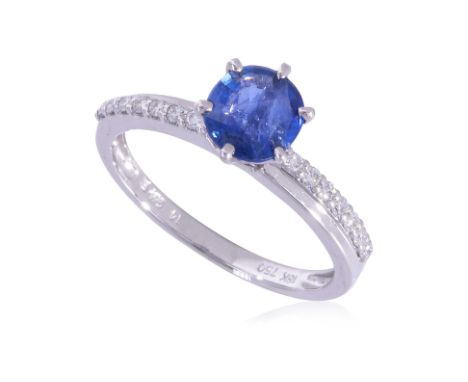 AN UNHEATED BURMESE SAPPHIRE AND DIAMOND RING
Featuring an off round sapphire weighing approximately 0.93 Cts, mounted in a w
