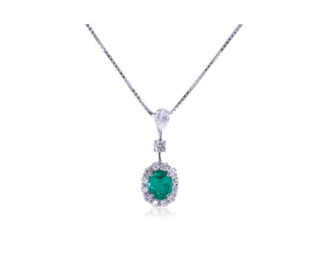 A VIVID GREEN COLOMBIAN EMERALD AND DIAMOND NECKLACE
Featuring an oval shaped Colombian emerald weighing approximately 1.04 C