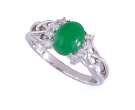 A JADEITE AND DIAMOND RING BY CHOW SANG SANG Featuring a green jadeite cabochon measuring approximately 7.8 x 6.0 x 2.6mm, mo