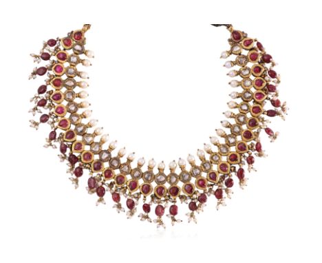 AN INDIAN RUBY, DIAMOND AND PEARL CHOKER Circa early 20th Century, featuring Kundan-set foil-backed rubies, foiled-backed dia