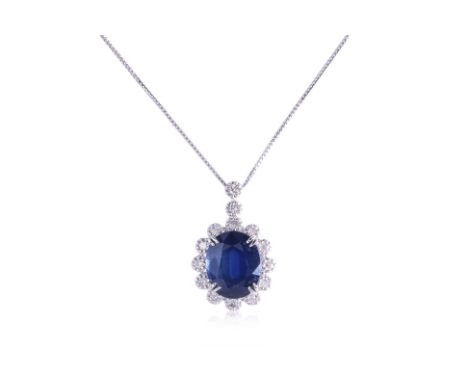 A SAPPHIRE AND DIAMOND NECKLACE
Featuring an oval blue sapphire weighing approximately 3.48 Cts(marked), mounted in a platinu