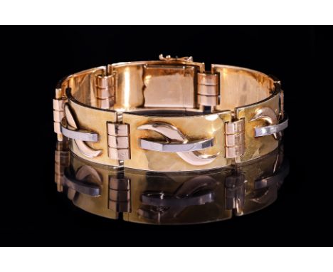 A TRI-COLOUR GOLD PANEL BRACELET BY JEAN DESPRES Featuring a tri-colour gold panel bracelet with French gold eagle marks to t