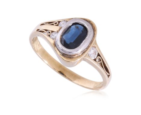 A SAPPHIRE AND DIAMOND TWO TONE RING
Featuring an oval shaped sapphire weighing approximately 0.70 Cts, mounted in a two tone