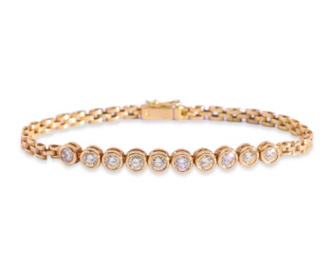 A DIAMOND BRACELET Featuring bezel set round brilliant cut diamonds totalling approximately 1.20 Cts, mounted in a yellow gol