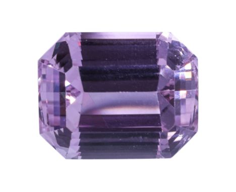 A VERY LARGE UNMOUNTED KUNZITE SPODUMENE
Featuring an emerald step cut kunzite spodumene weighing approximately 55.18 Cts. Ac