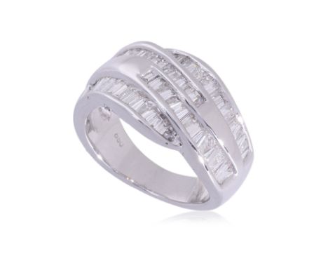 A HIGH KARAT GOLD DIAMOND RING
Featuring tapered baguette cut diamonds totalling approximately 1.60 Cts, mounted in a white g