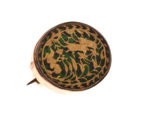 Gold coloured metal oval green foil backed brooch decorated with a hunting scene   Condition: 