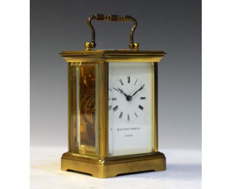 Modern brass cased carriage clock, the white enamel dial with Roman numerals   Condition: 