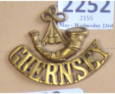 British Shoulder Titles Brass-L1 Bugle/Guernsey                                                        