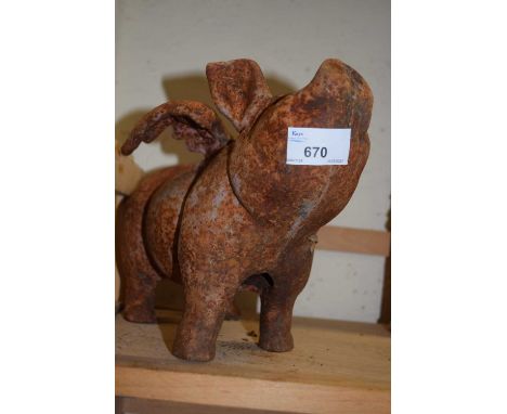 Cast iron model of a flying pig