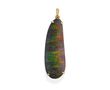 the irregular shaped polished black opal plaque in a yellow claw setting, suspended from a plain polished balelength 7.0cmCon