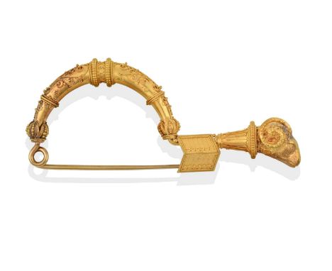 of archaeological style, the fibula arch decorated with yellow wire and beadwork throughout, with similar work to the neck, t