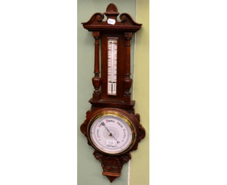 An oak cased aneroid barometer, circa 1910