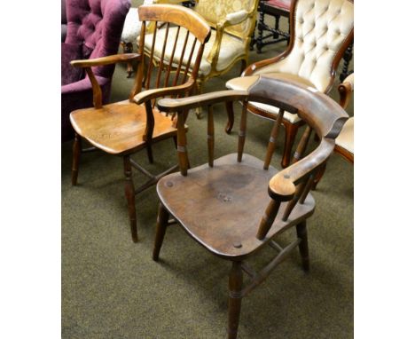 A 19th century oak captain's chair together with an oak stick back chair (2)