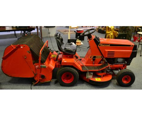 A Westwood T1200 ride on lawn mower, 12hp, five levels of cut, electric start and pull start, collector, 36 inch rotary cut (