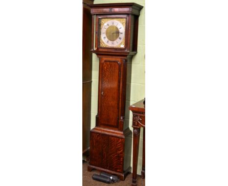 An oak eight day longcase clock, square brass dial bearing later inscription J. Jones, Holyhead