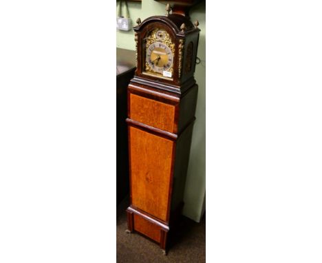 A German striking pedestal clock, dial with retailers plaque inscribed Manoah Rhodes & Sons Ltd, Bradford, movement back plat