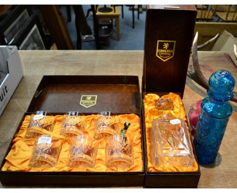 A Mdina glass bottle together with a cased Edinburgh decanter and tumblers etc (4)