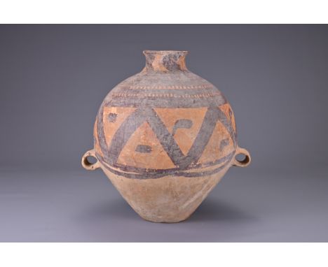 A LARGE CHINESE NEOLITHIC PAINTED POTTERY JAR, MACHANG (C. 2300 - 2000 BC). Fairly heavily potted in a yellowish-brown potter