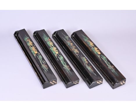 FOUR CHINESE LACQUERED MAHJONG RACKS, CIRCA 1900. Each box of rectangular form, with outer rack, the tops decorated with fish