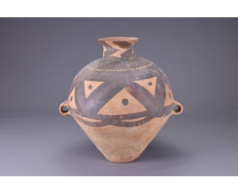 A LARGE CHINESE NEOLITHIC PAINTED POTTERY JAR, MACHANG (C. 2300 - 2000 BC). Fairly heavily potted in a yellowish-brown potter