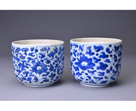 TWO CHINESE BLUE AND WHITE PORCELAIN JARS, 18TH CENTURY. Each with continuous floral scroll decoration. Kangxi period (1662-1