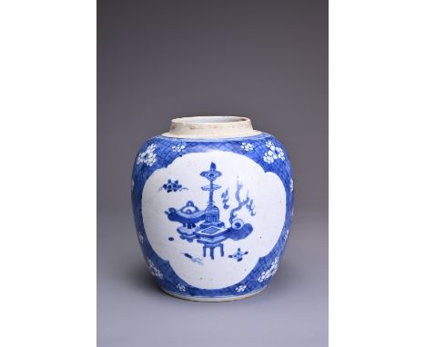 A CHINESE BLUE AND WHITE PORCELAIN GINGER JAR, 18TH CENTURY. Two quatrefoil panels decorated with treasured objects on a crac