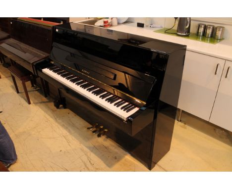 Kawai (c2007) A Model K-15E upright piano in a bright ebonised case; together with a matching stool. 