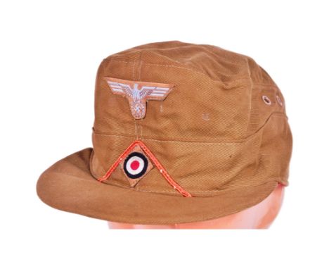A WWII Second World War Third Reich Nazi German Afrika Korps field cap. Tan / desert fabric front applied Eagle Swastika patc
