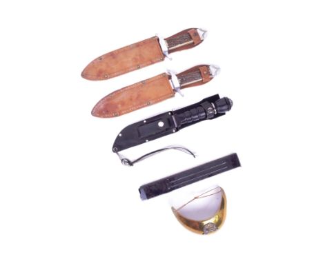 A collection of assorted Militaria comprising a saw back blade survival knife with ball compass pommel, x2 horn hiled knives 