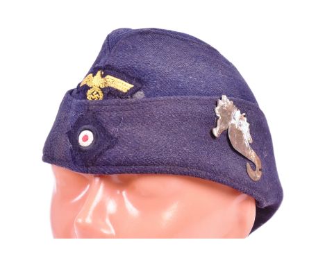 A WWII Second World War Third Reich Nazi German Kriegsmarine Flotilla Side Cap. Blue wool construction with front cockade rou