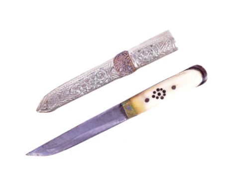 A 19th Century Tibetan / Bhutanese ladies belt knife. Bone handle secured to the tang with rivets, clipped single edged blade