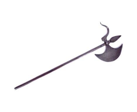 A 19th Century Indian Elephant Goad / Ankus. Leaf shaped terminal spike, crescent shaped axe head shaped with floral motifs a