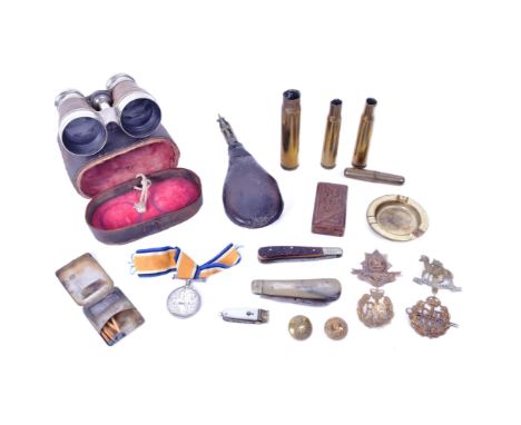 A collection of assorted militaria to include; WWI First World War medal awarded to one 31767 Pte G W Colborn of the Machine 