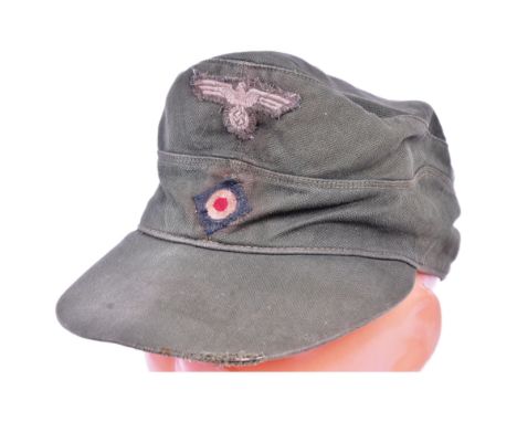 A WWII Second World War Third Reich Nazi German Afrika Korps M41 field cap. Khaki with stitched Eagle Swastika patch and roun