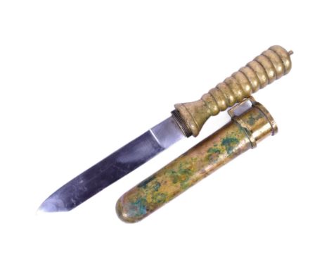 A WWII Second World War Third Reich Nazi German Kriegsmarine divers knife. Heavy duty brass ribbed grip with screw base that 